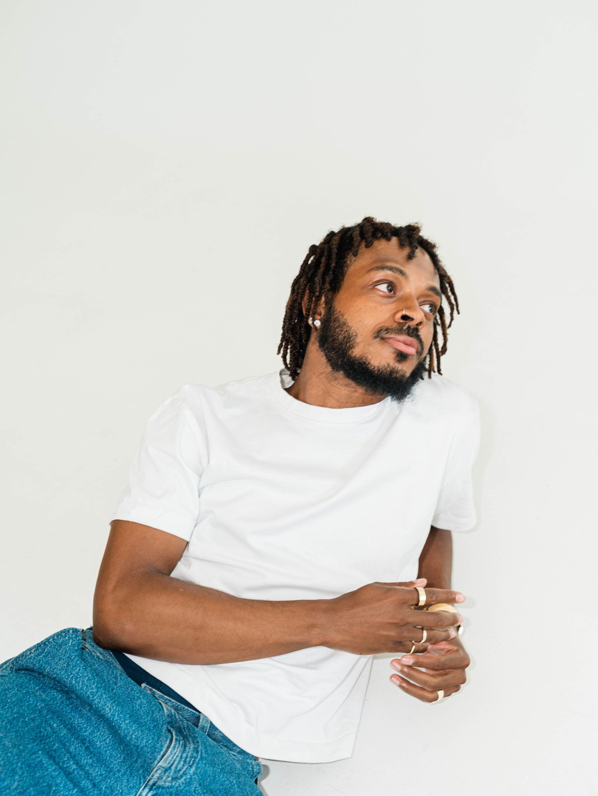 Man sitting and looking happy after a pedicure service at a Columbus nail studio